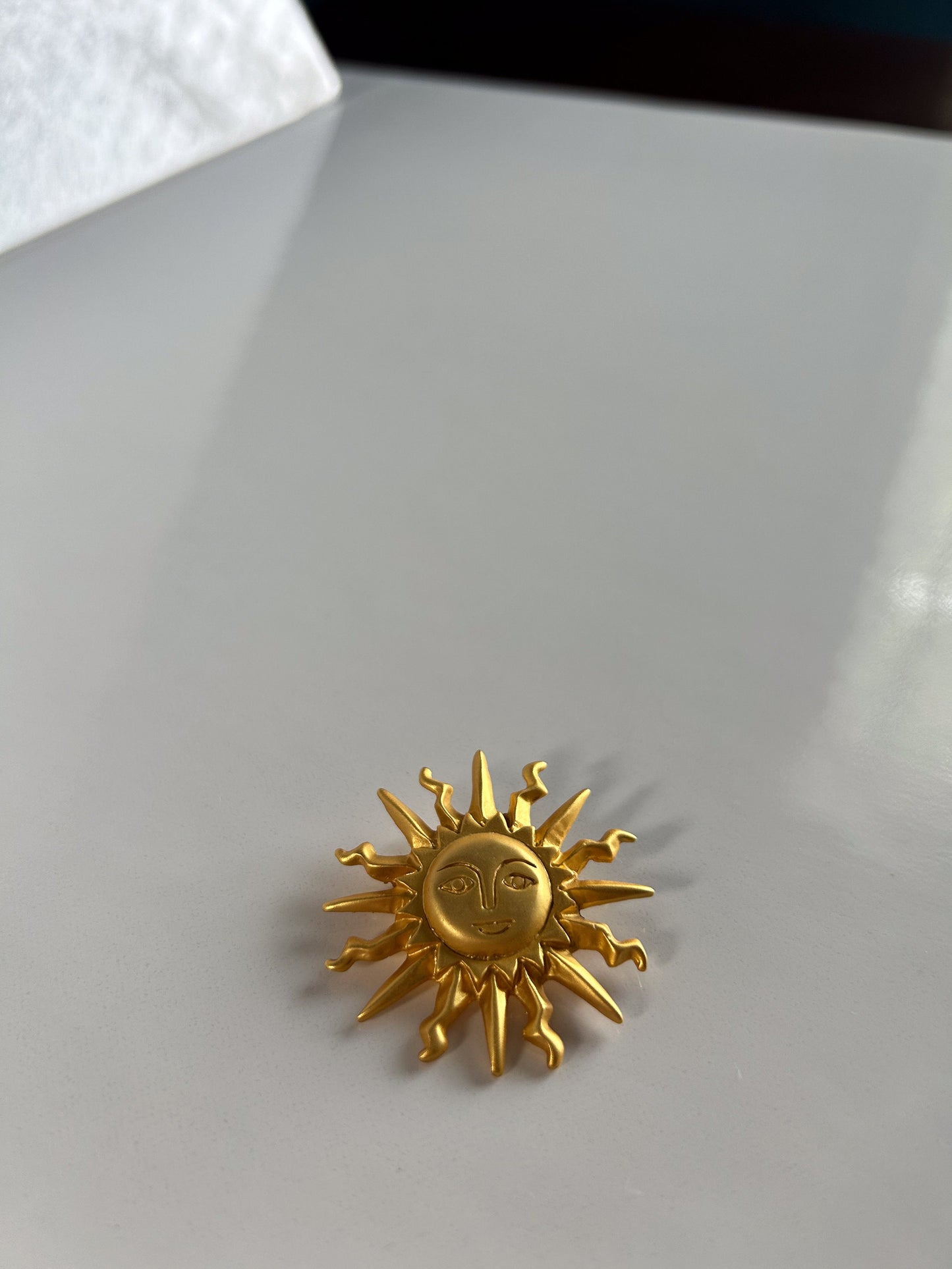 Vintage Art Nouveau golden sun brooch