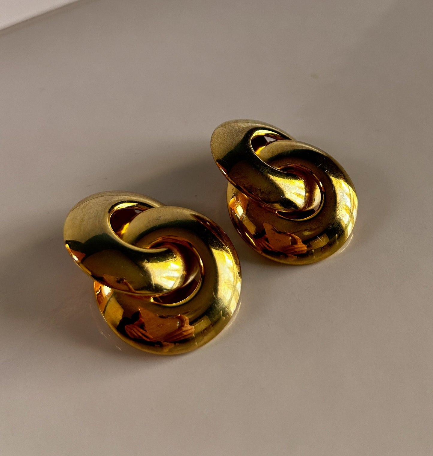Vintage 1980's gold knot clip on earrings
