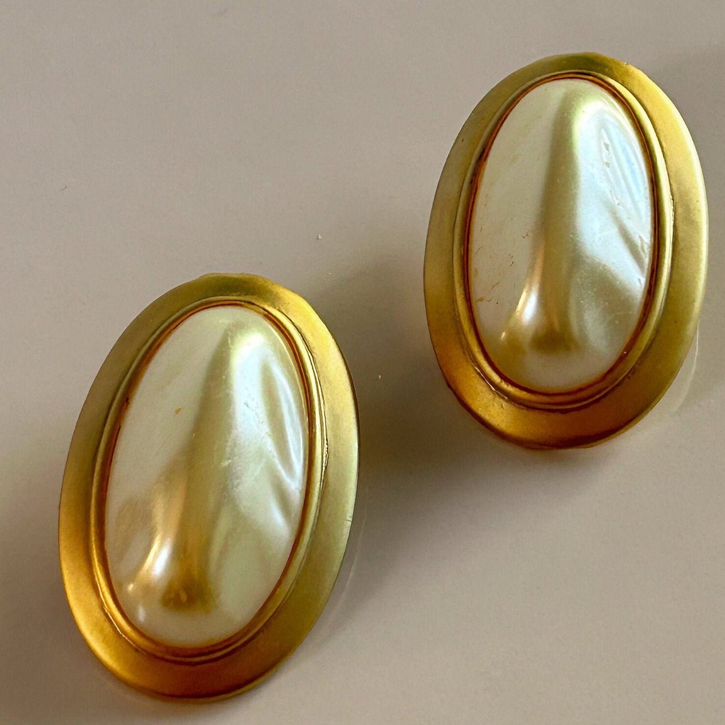 Vintage gold and white oval clip on earrings