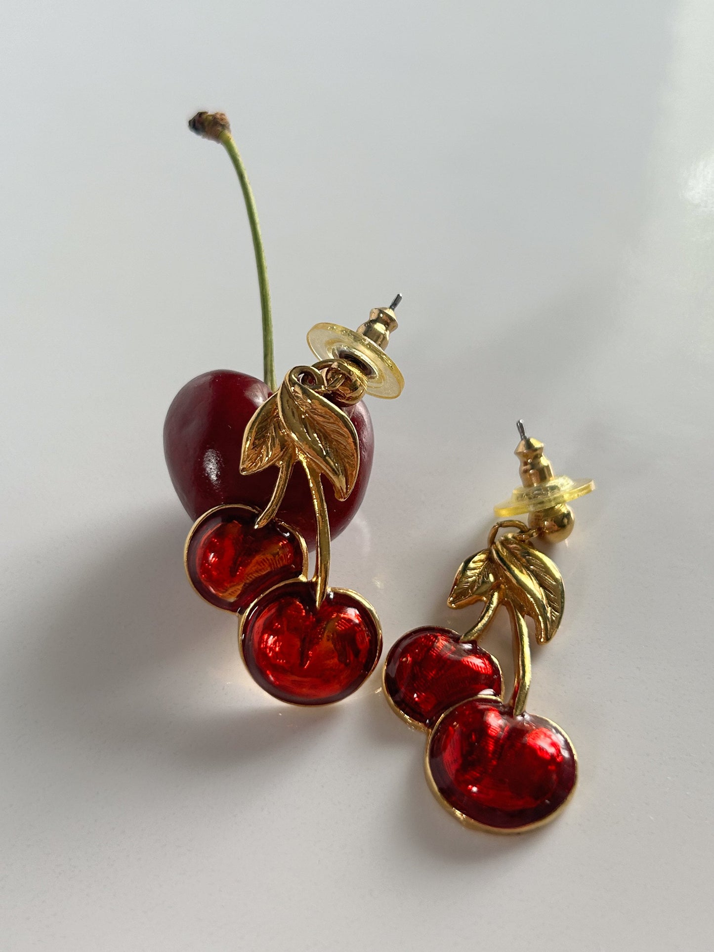 Vintage Avon cherry pierced earrings gold and red.