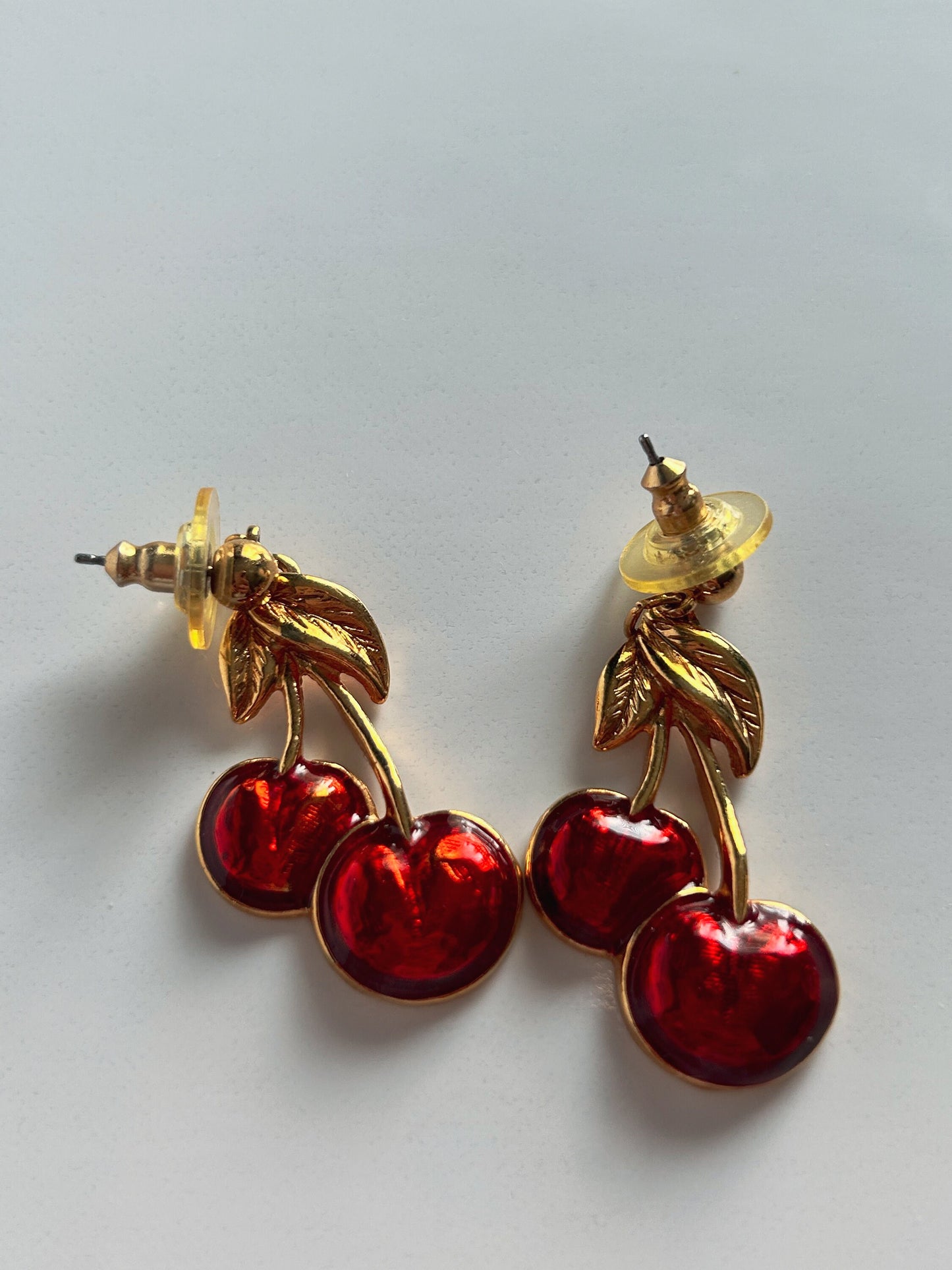 Vintage Avon cherry pierced earrings gold and red.