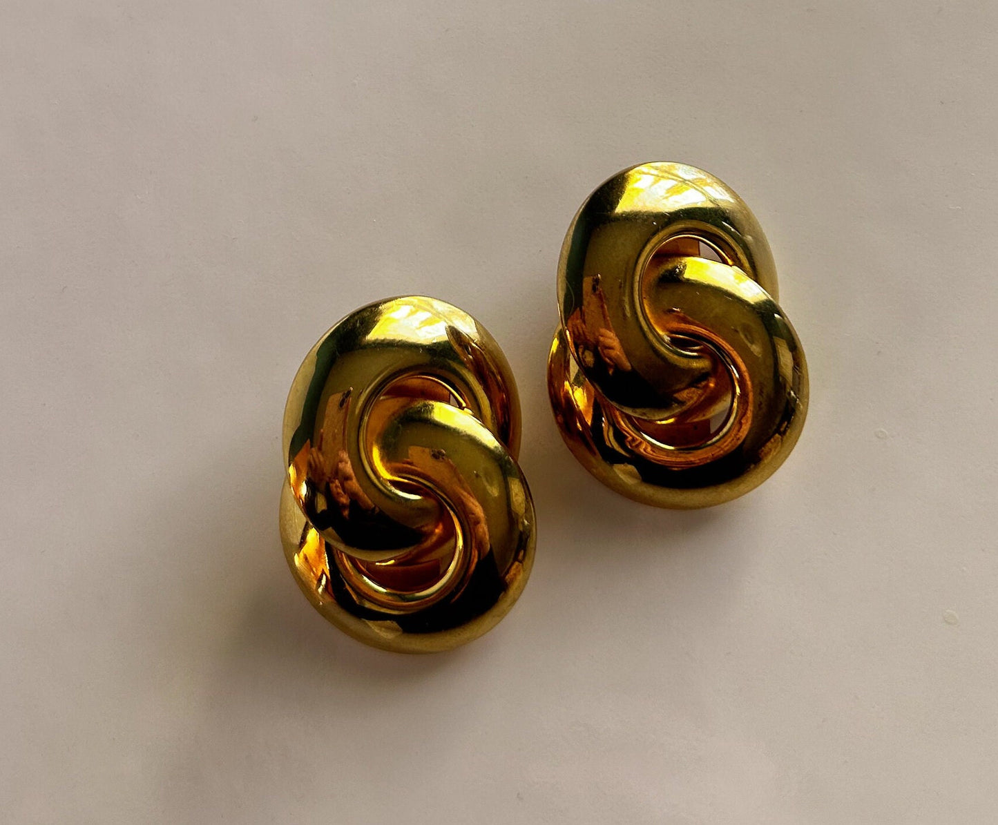 Vintage 1980's gold knot clip on earrings