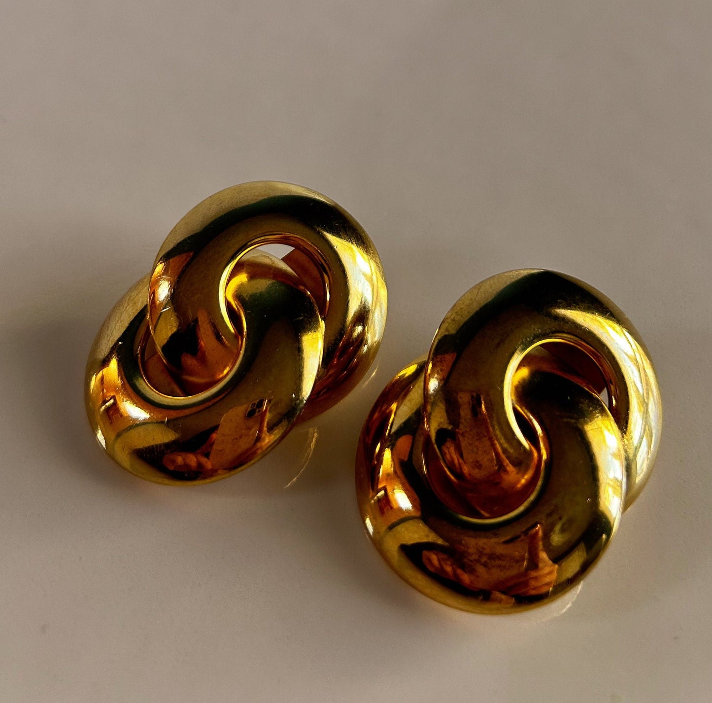 Vintage 1980's gold knot clip on earrings