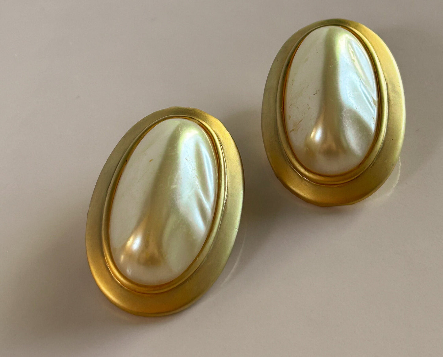 Vintage gold and white oval clip on earrings