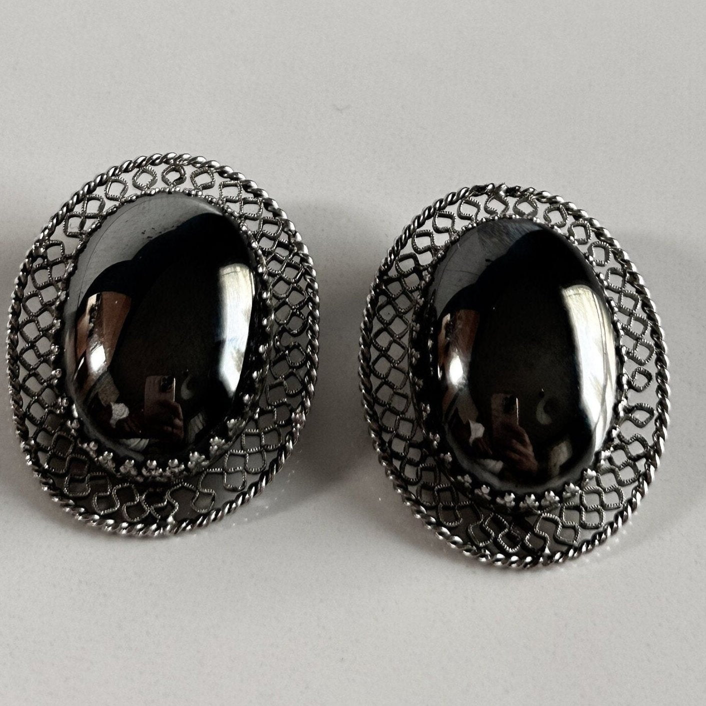 Vintage signed black and silver clip on earrings