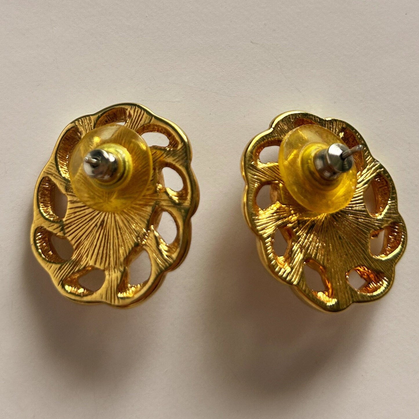 Vintage signed Monet gold and white earrings.