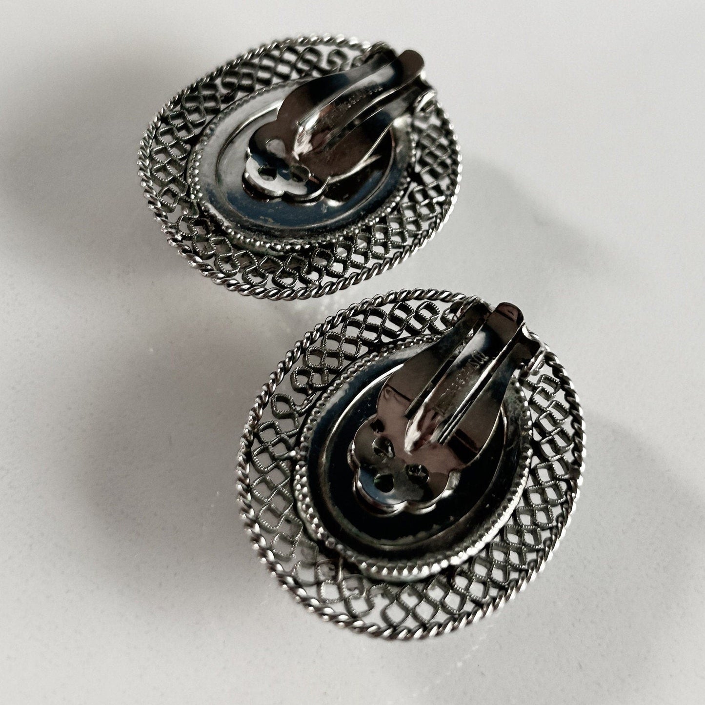 Vintage signed black and silver clip on earrings
